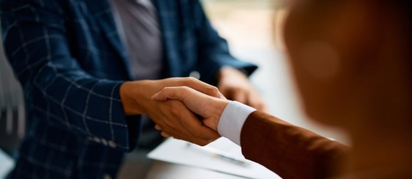 two people shaking hands