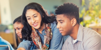 Man and woman learning on a computer